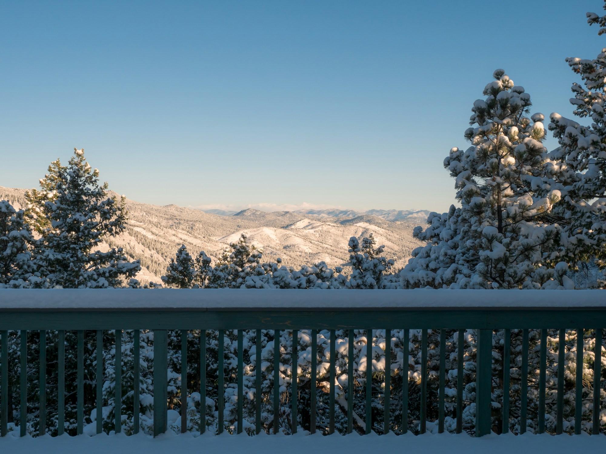 Cable railing on a deck with a mountain view